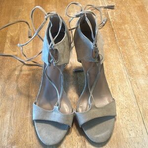 Christian Siriano high heels shoes. The strappy design with an almond toe shape.